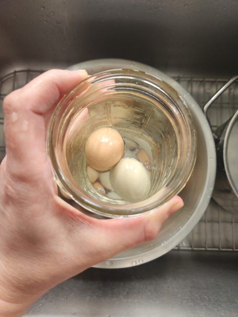 peeling hard-boiled eggs using a jar