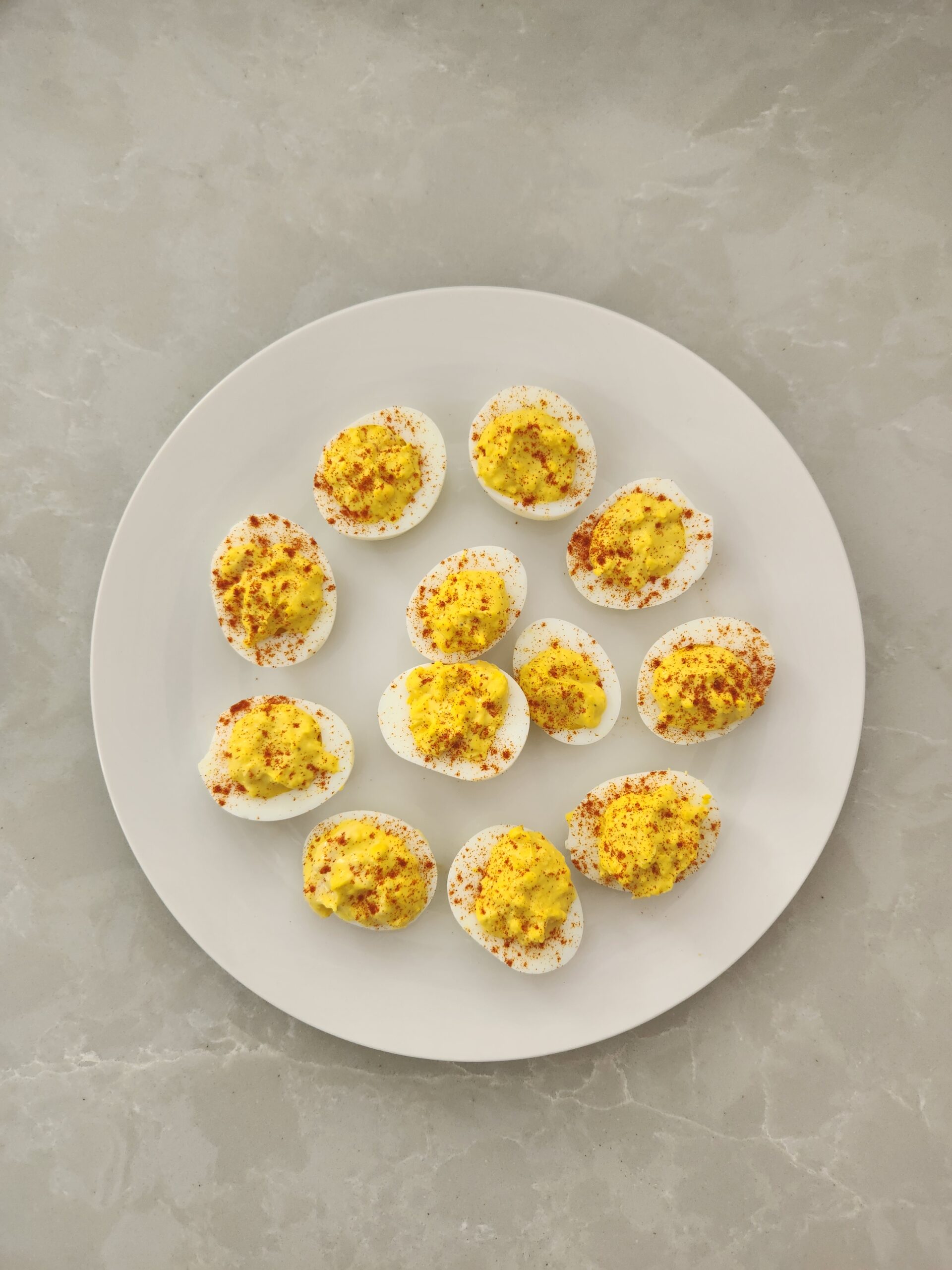 deviled eggs with Dijon mustard on a plate