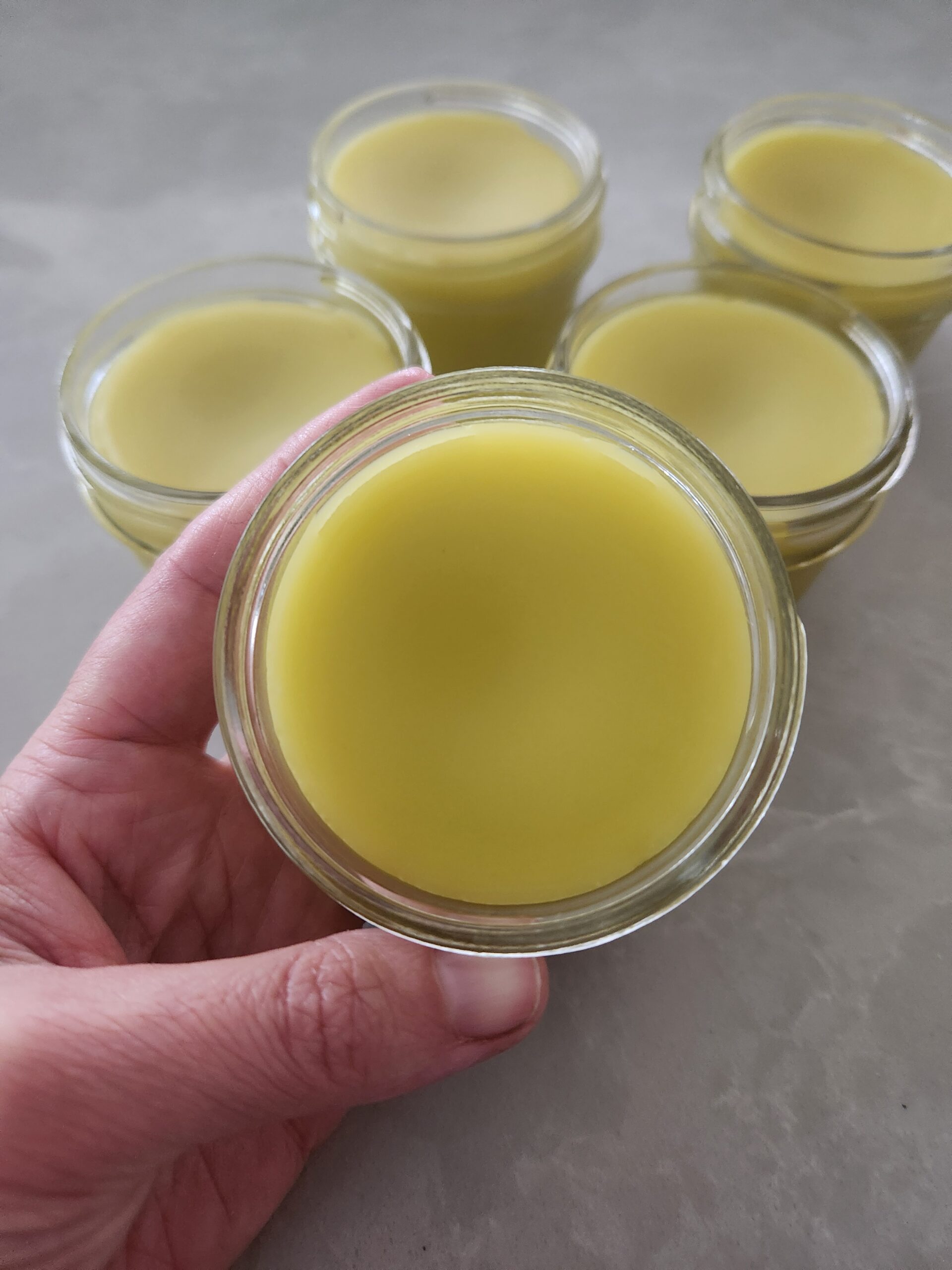 calendula yarrow salve in glass jars