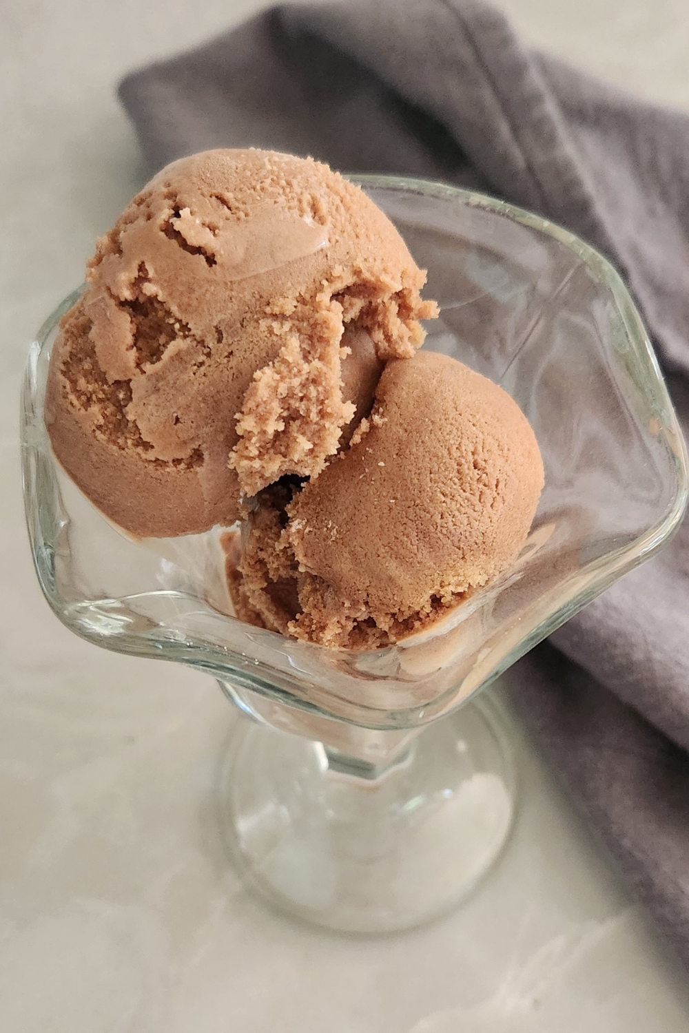 homemade chocolate ice cream in glass dish