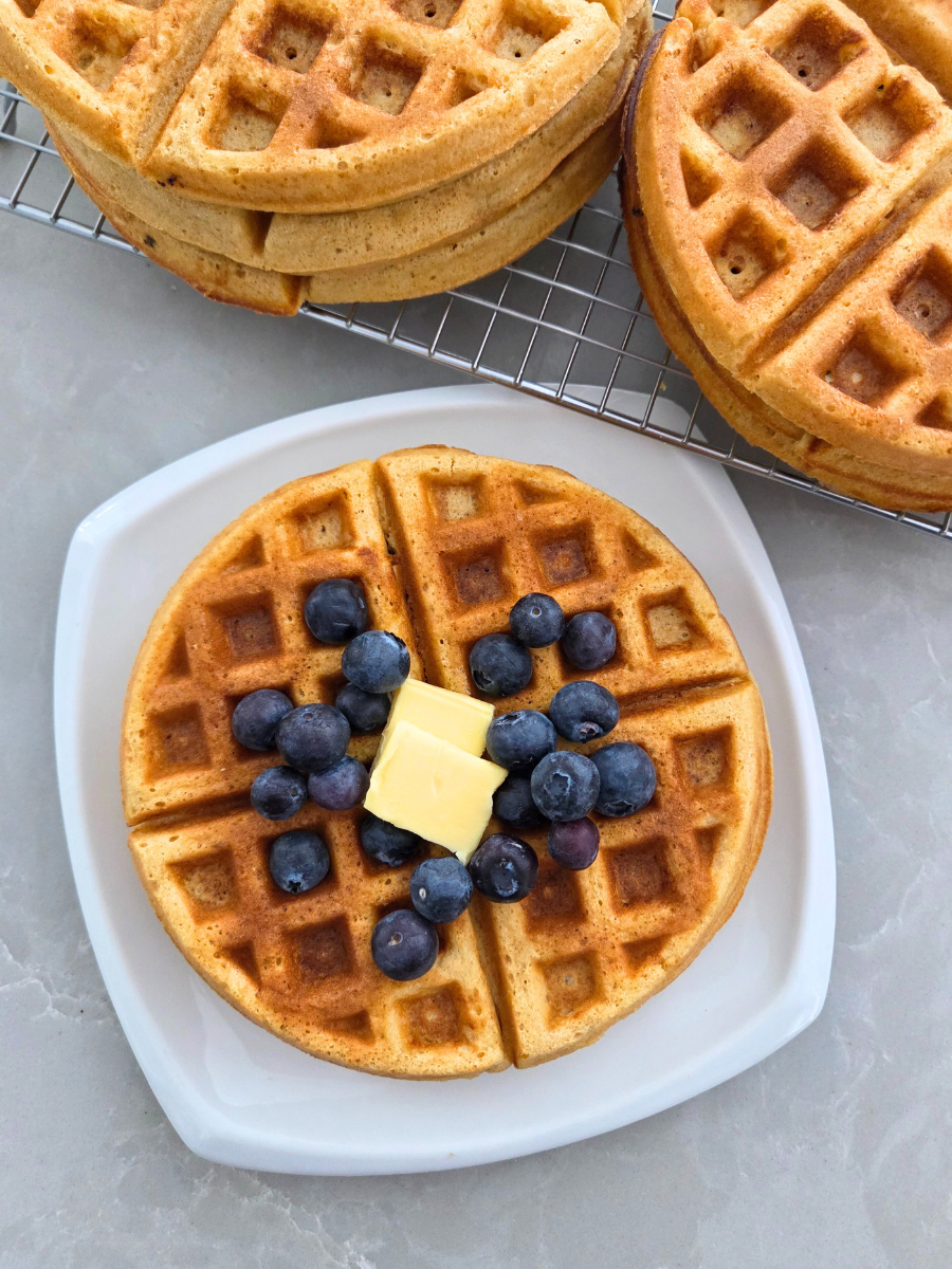 Fresh milled flour waffles cooling on a wire rack