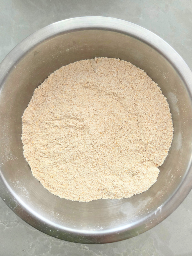 Fresh milled flour in a mixing bowl for banana bread.