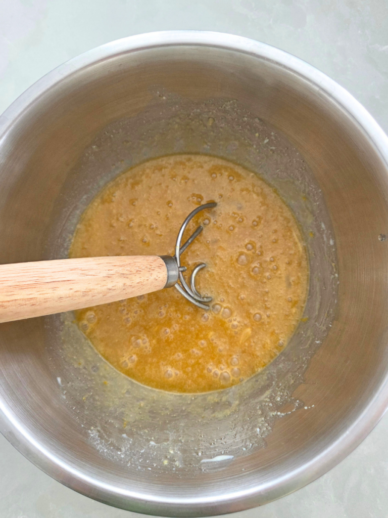 Wet ingredients mixed together for fresh milled banana bread batter.