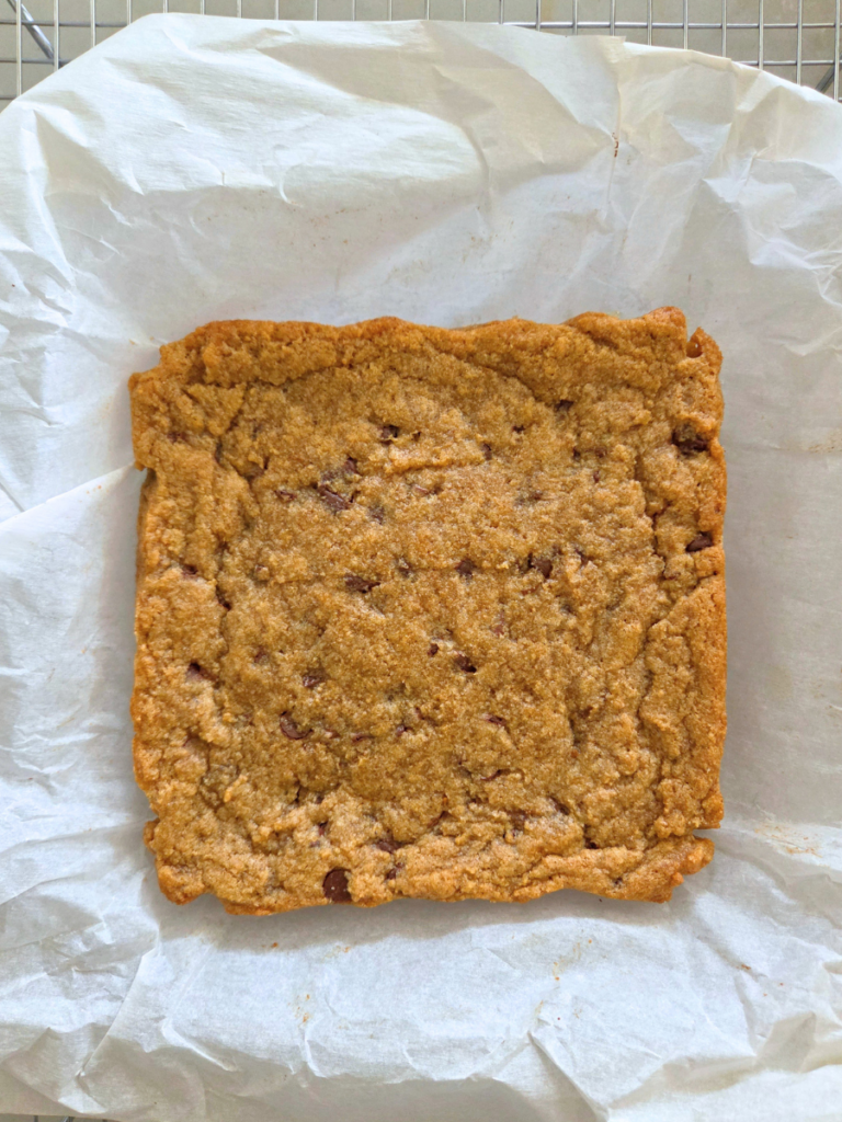 Freshly baked banana blondies with golden edges in an 8x8 pan