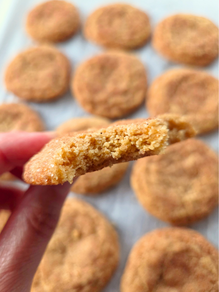 Inside texture of a fresh milled flour snickerdoodle showing the soft chewy center and crisp edges.