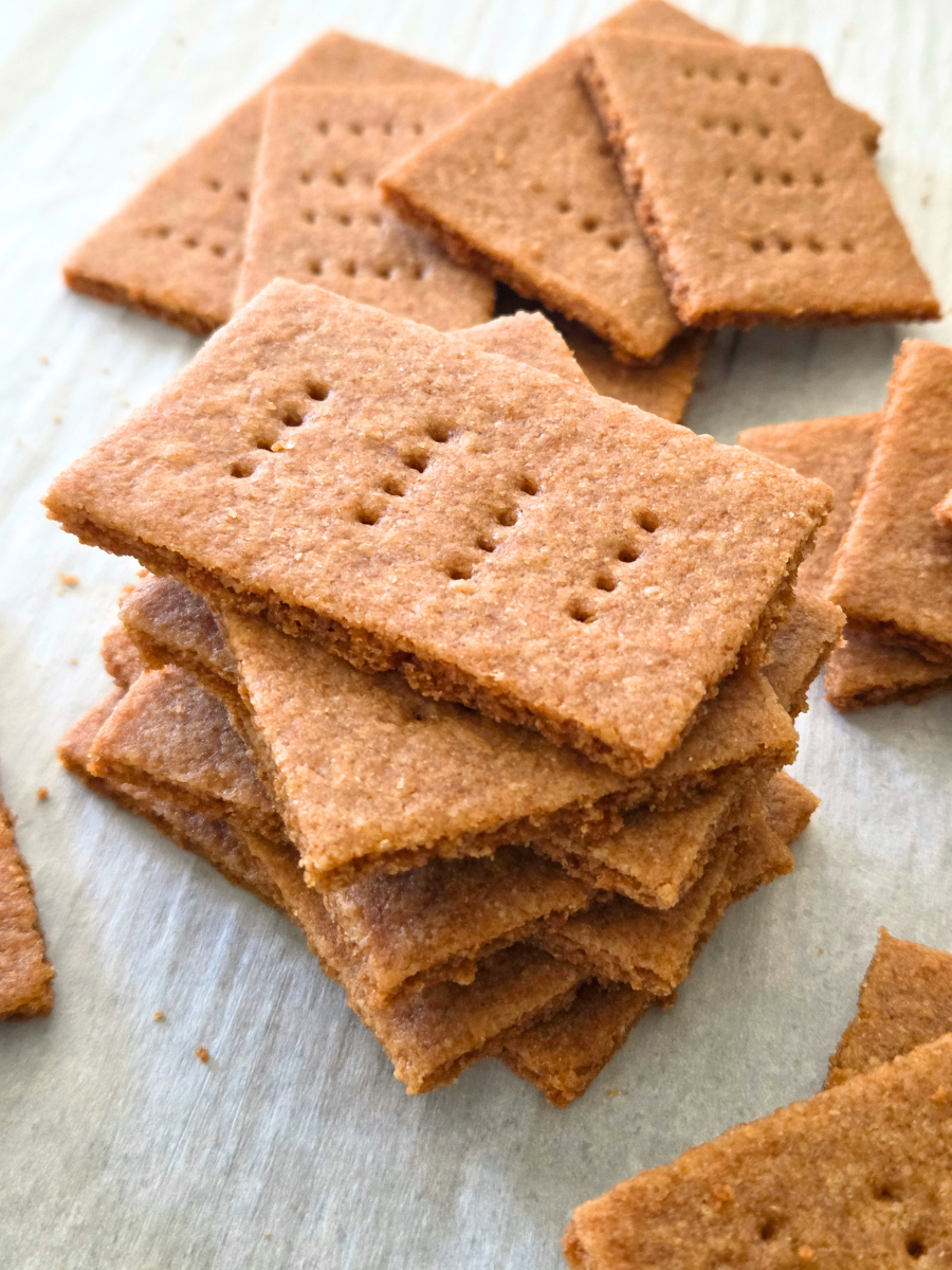 Stack of crisp homemade fresh milled flour graham crackers made with soft white wheat.