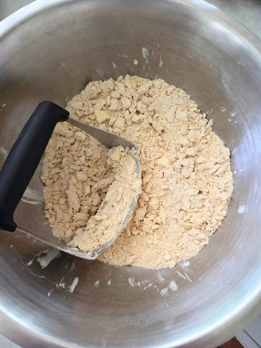 Butter cut into the flour mixture until it resembles coarse crumbs.