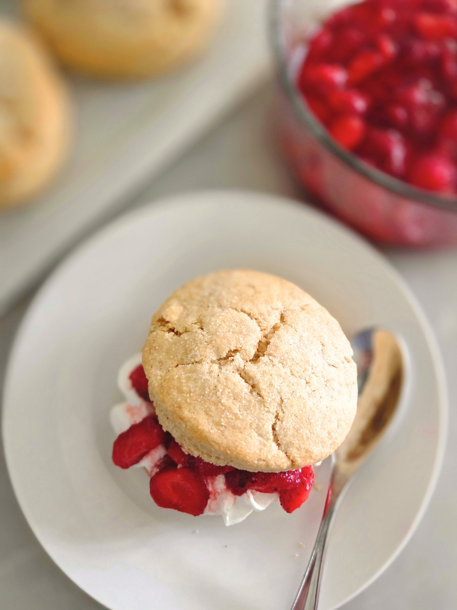 Fresh milled flour strawberry shortcake topped with juicy strawberries and whipped cream for an easy summer dessert.
