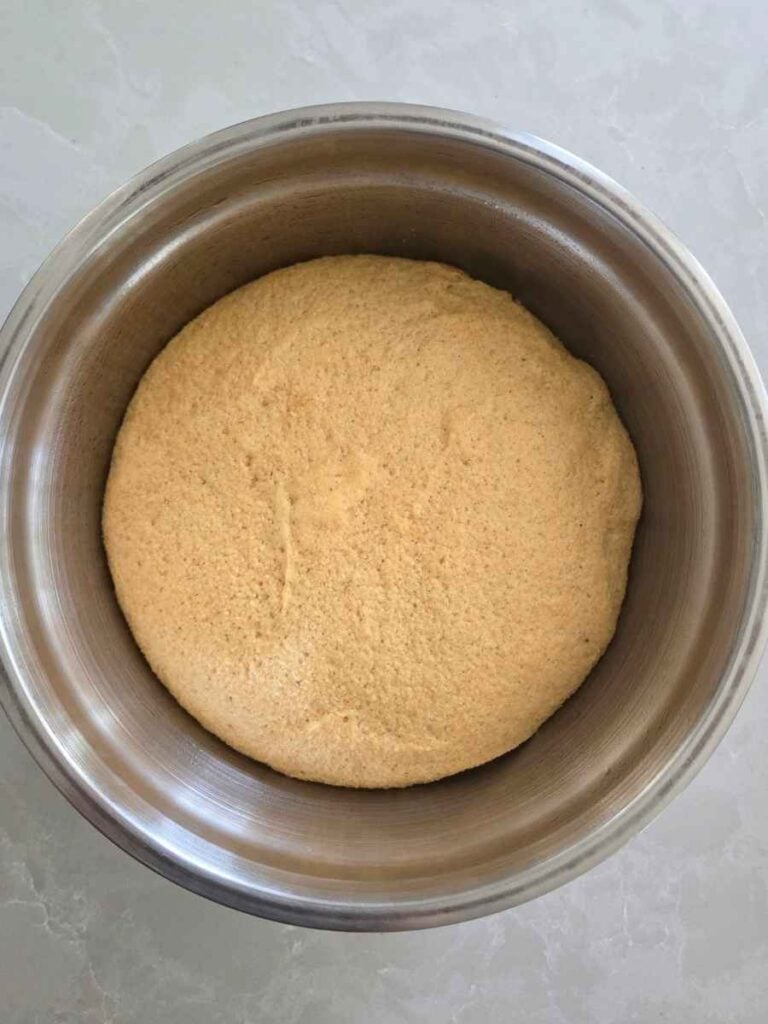 Cinnamon roll dough after the first rise, doubled in size.