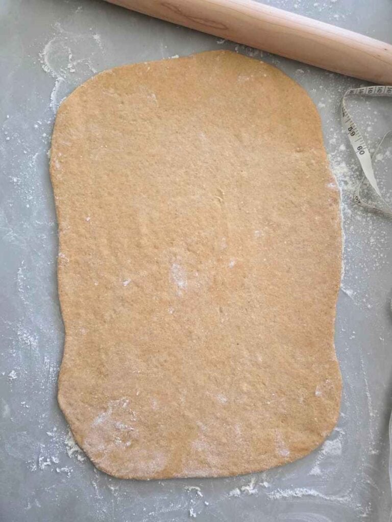 Dough rolled into a large rectangle before adding the filling.