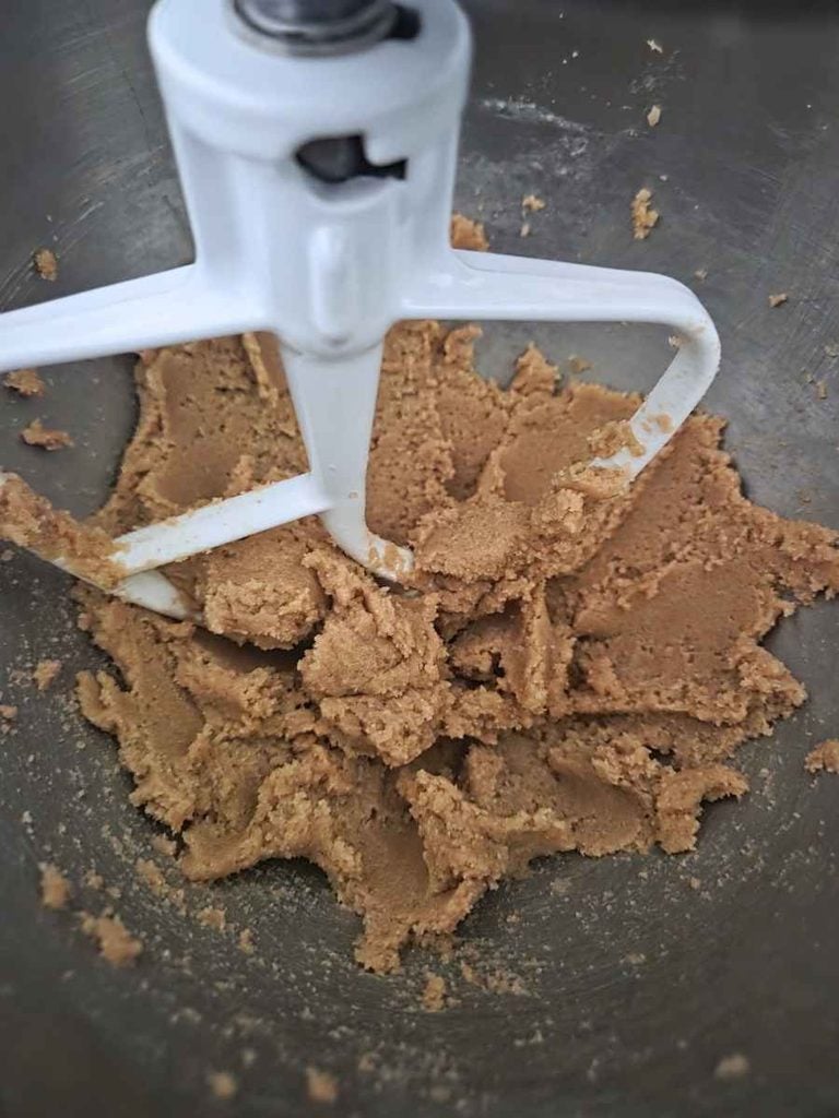 Butter and brown sugar in a stand mixer for cowboy cookie dough