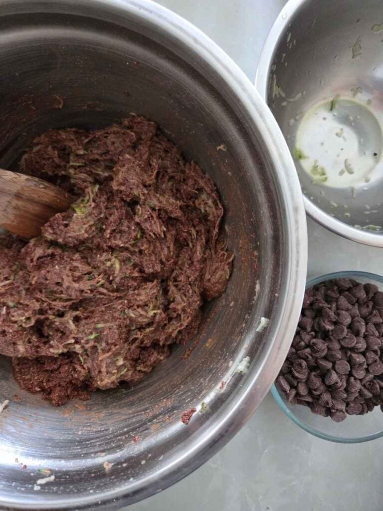 Chocolate cake batter after mixing in the finely shredded zucchini.