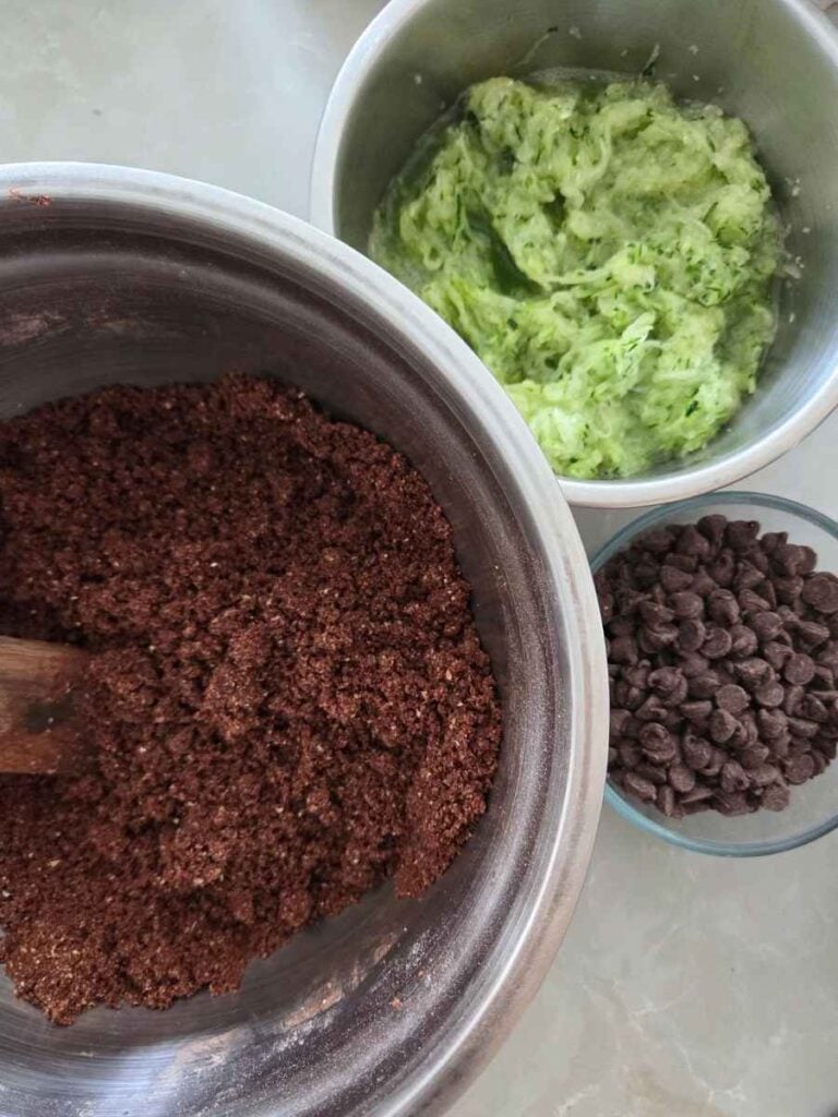 Dry chocolate cake ingredients mixed together before adding the shredded zucchini.